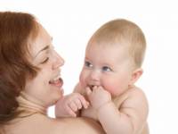 bigstockphoto_Small_Baby_With_Mom_Isolated_3030760
