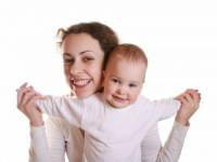 bigstockphoto_Mother_With_Baby_Try_To_Fly_481809
