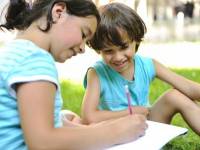 bigstock_Education_in_park_happy_child_15440054