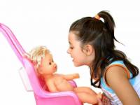 bigstockphoto_Girl_With_Doll_911895